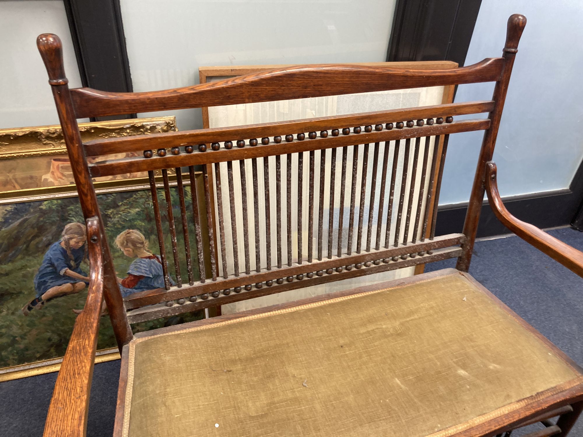 An early 20th century oak two seater chair back settee, width 100cm, depth 50cm, height 99cm